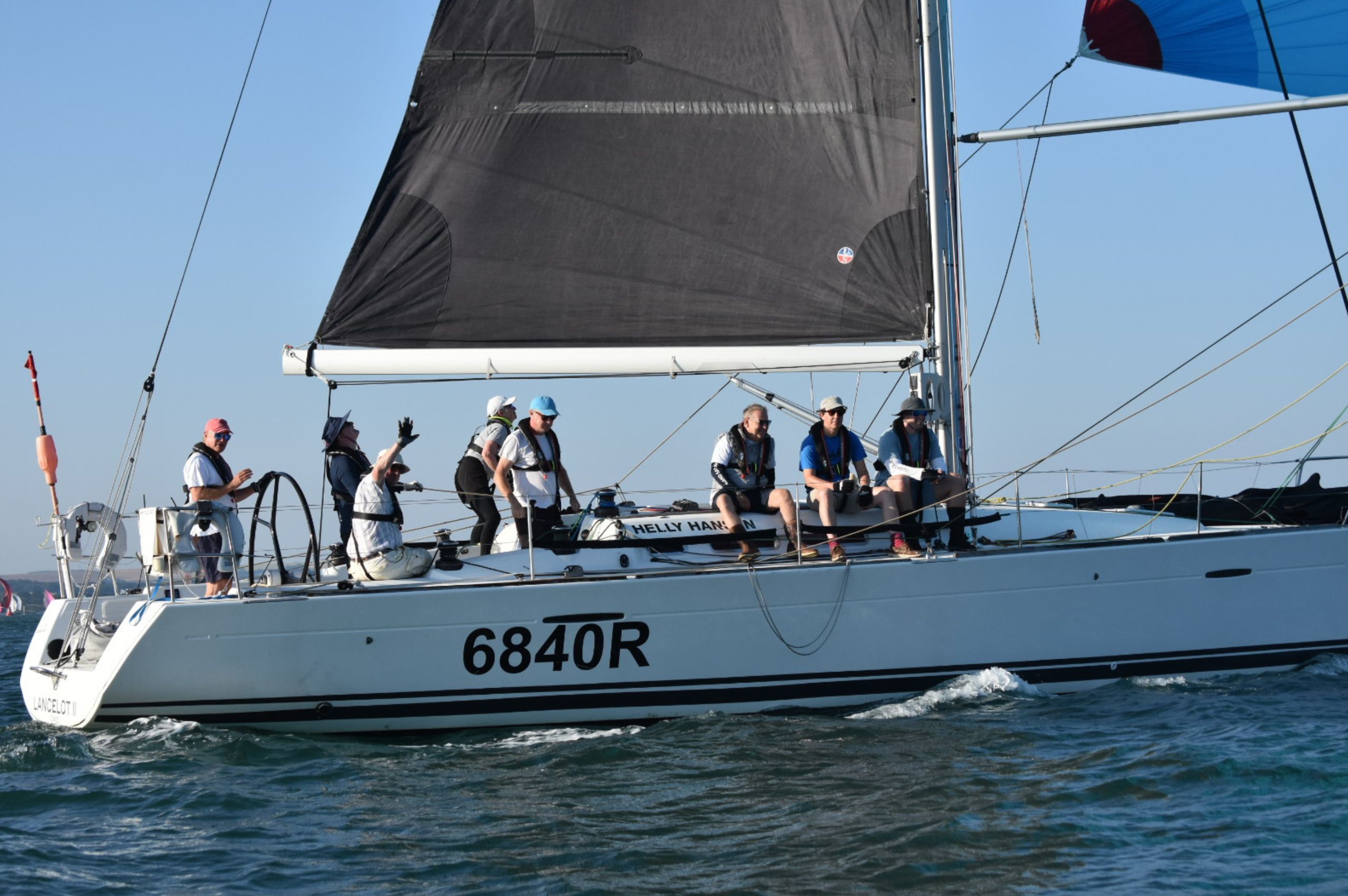 Team onboard Fairview Sailing yacht, Lancelot II takes part in the Round the Island Race